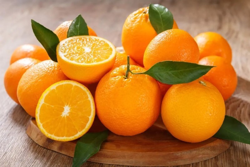 ăn cam rồi uống trà có sao không