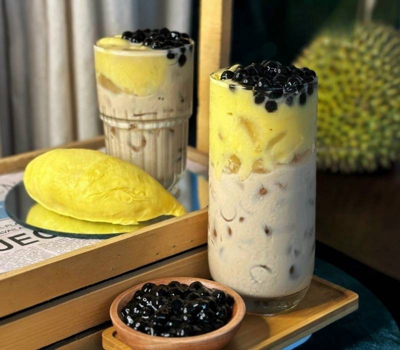 Ăn sầu riêng uống trà sữa có sao không?
